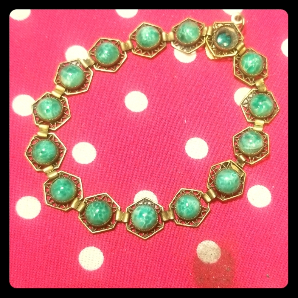 Vintage bracelet with green stones